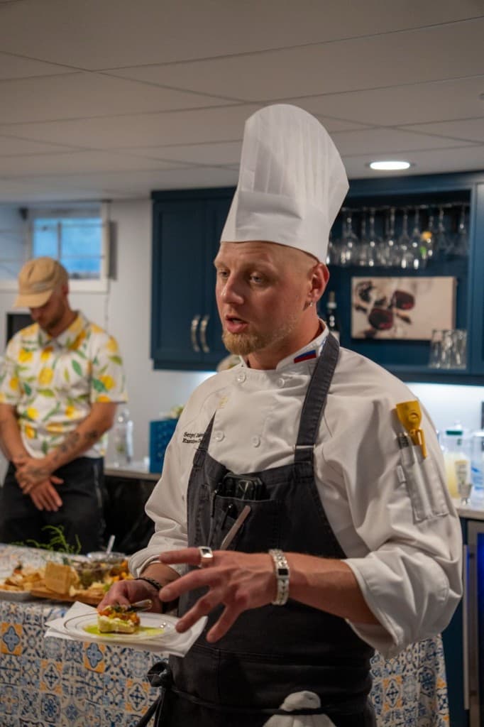 Chef Sergei Didenko presenting a course during the bridal shower
