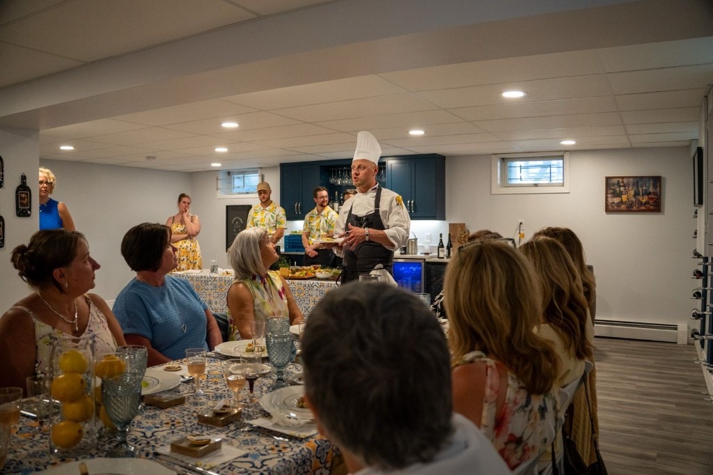 Chef Sergei Didenko speaking to guests at Cathy's bridal shower