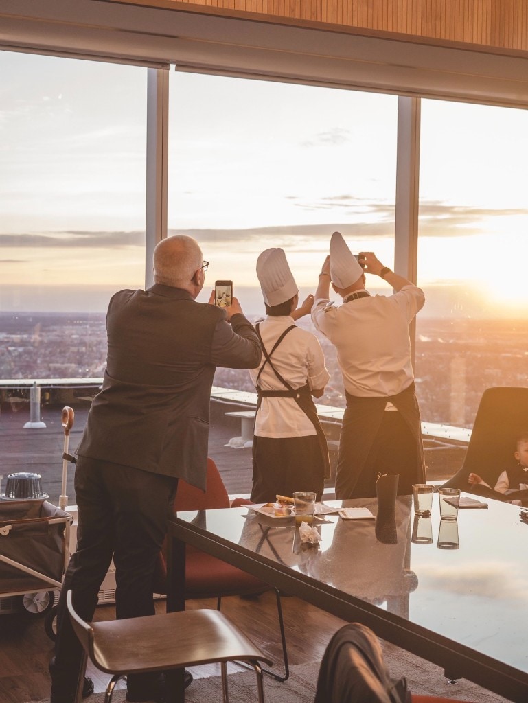 Chef team watching the sunset during Anna and Sergei's wedding celebration
